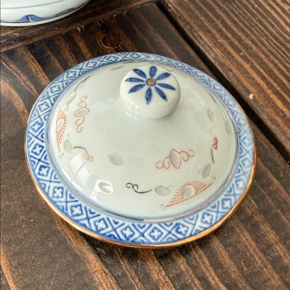 Elegant Floral Teapot with Blue and Orange Accents - Picture 4 of 7